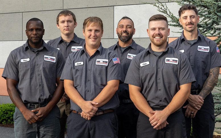 Group of Regan Service Technicians outside the Providence office